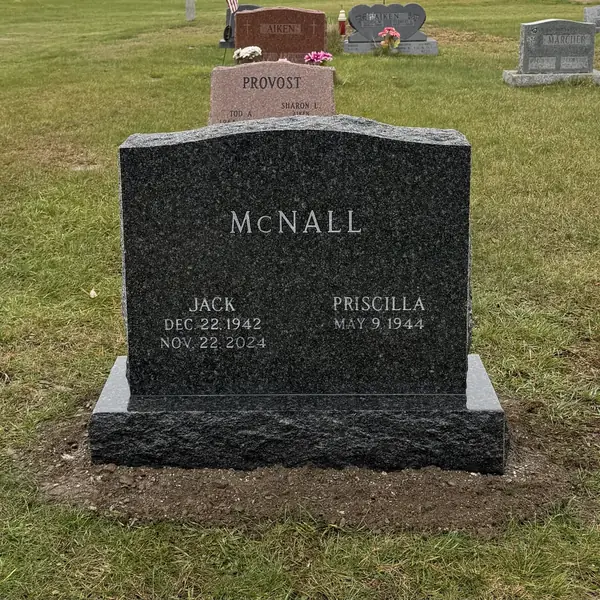 Classic upright granite monument — example 84