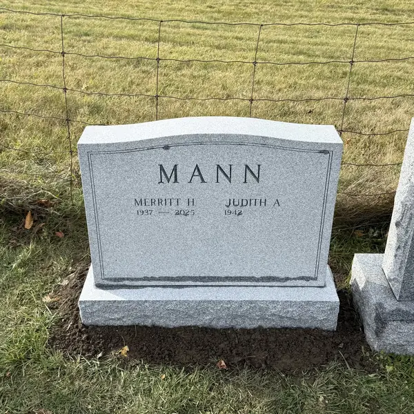 Classic upright granite monument — example 85