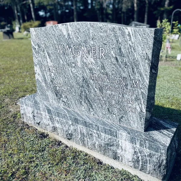 Classic upright granite monument — example 142