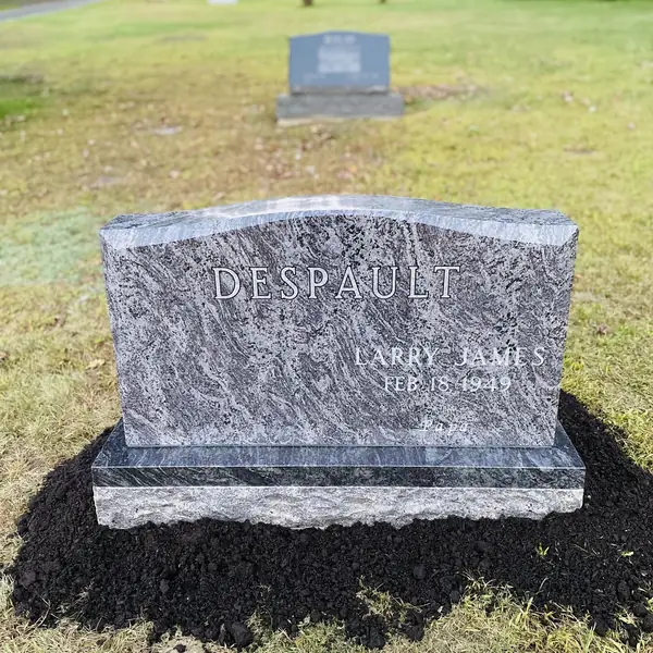 Classic upright granite monument — example 144
