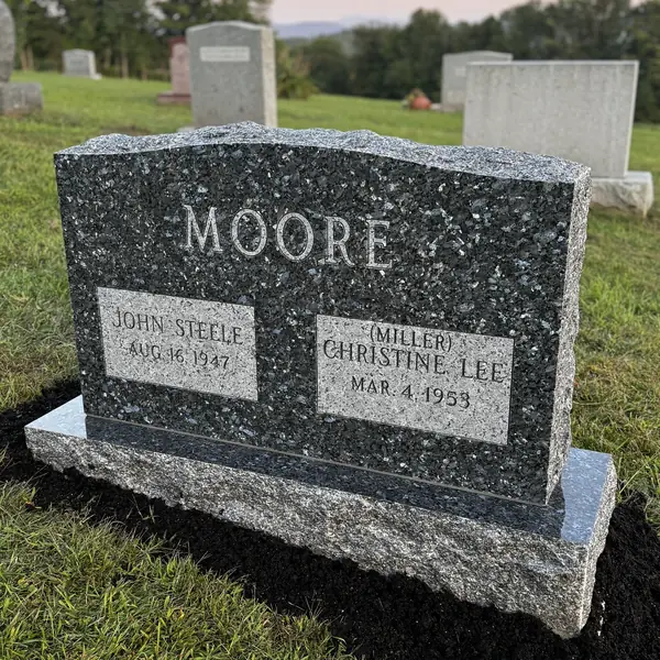 Classic upright granite monument — example 147