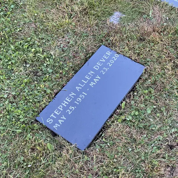 Flat granite marker — Champlain Monuments