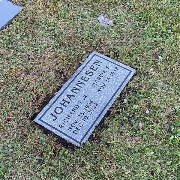 Flat granite marker — Champlain Monuments
