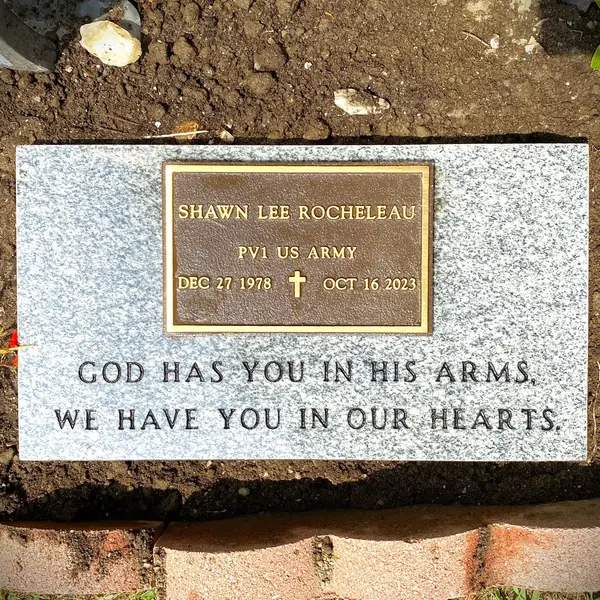 Flat granite marker — Champlain Monuments