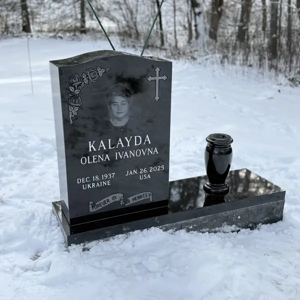 Classic upright granite monument — example 33